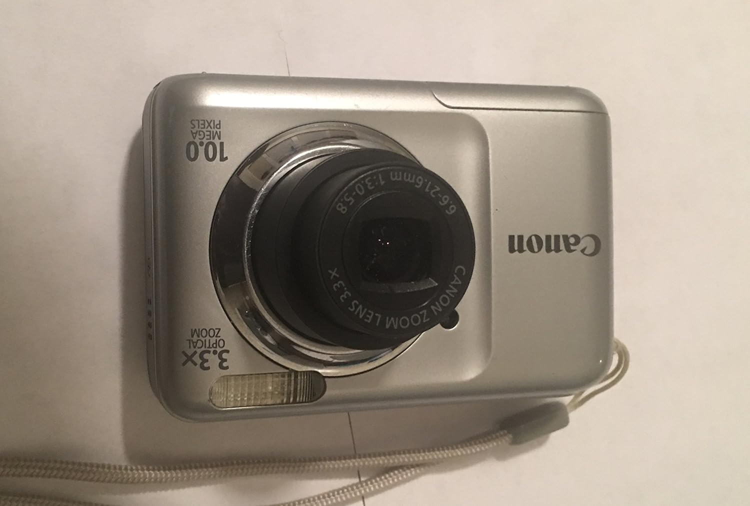 Canon PowerShot A1100IS 12.1 MP Digital Camera with 4x Optical Image Stabilized Zoom and 2.5-inch LCD (Silver) (OLD MODEL)