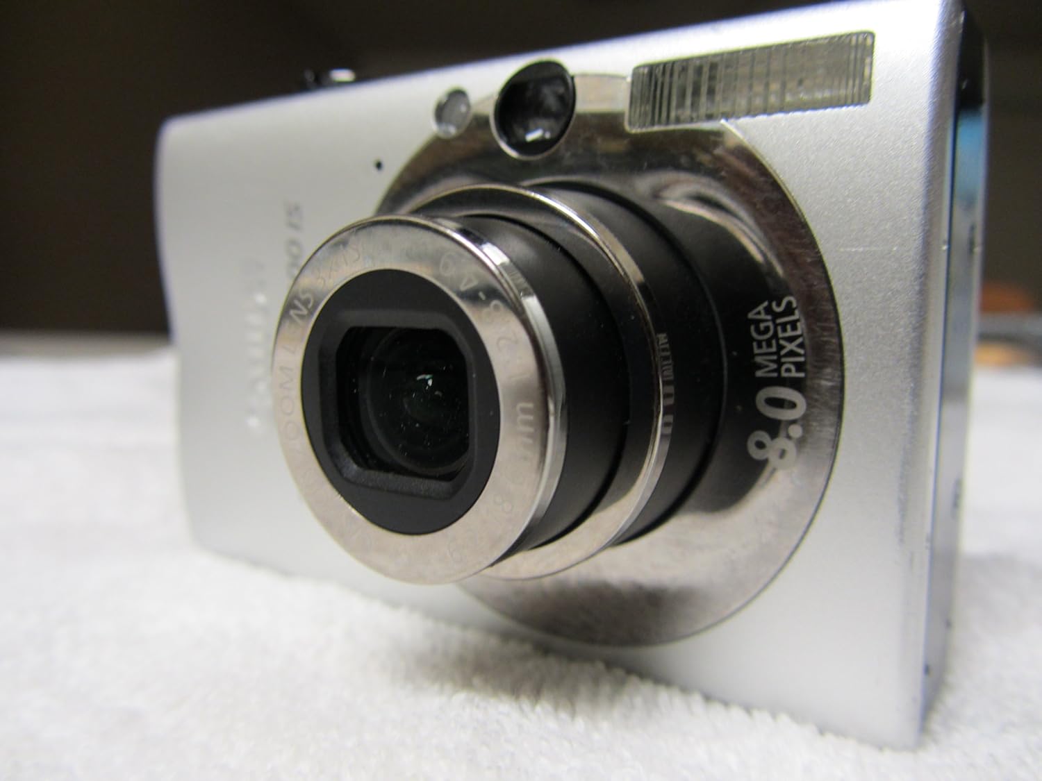 Canon PowerShot SD1100IS 8MP Digital Camera with 3x Optical Image Stabilized Zoom (Silver)
