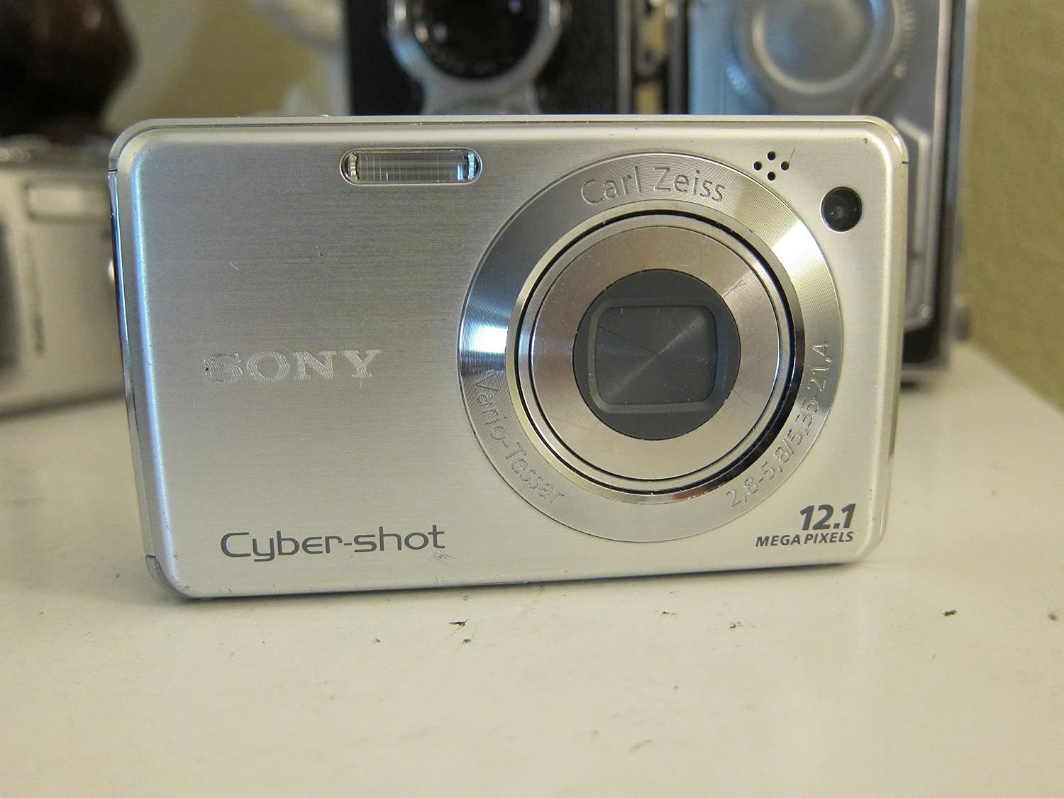 Sony Cyber-shot DSC-W230 12 MP Digital Camera with 4x Optical Zoom and Super Steady Shot Image Stabilization (Silver)